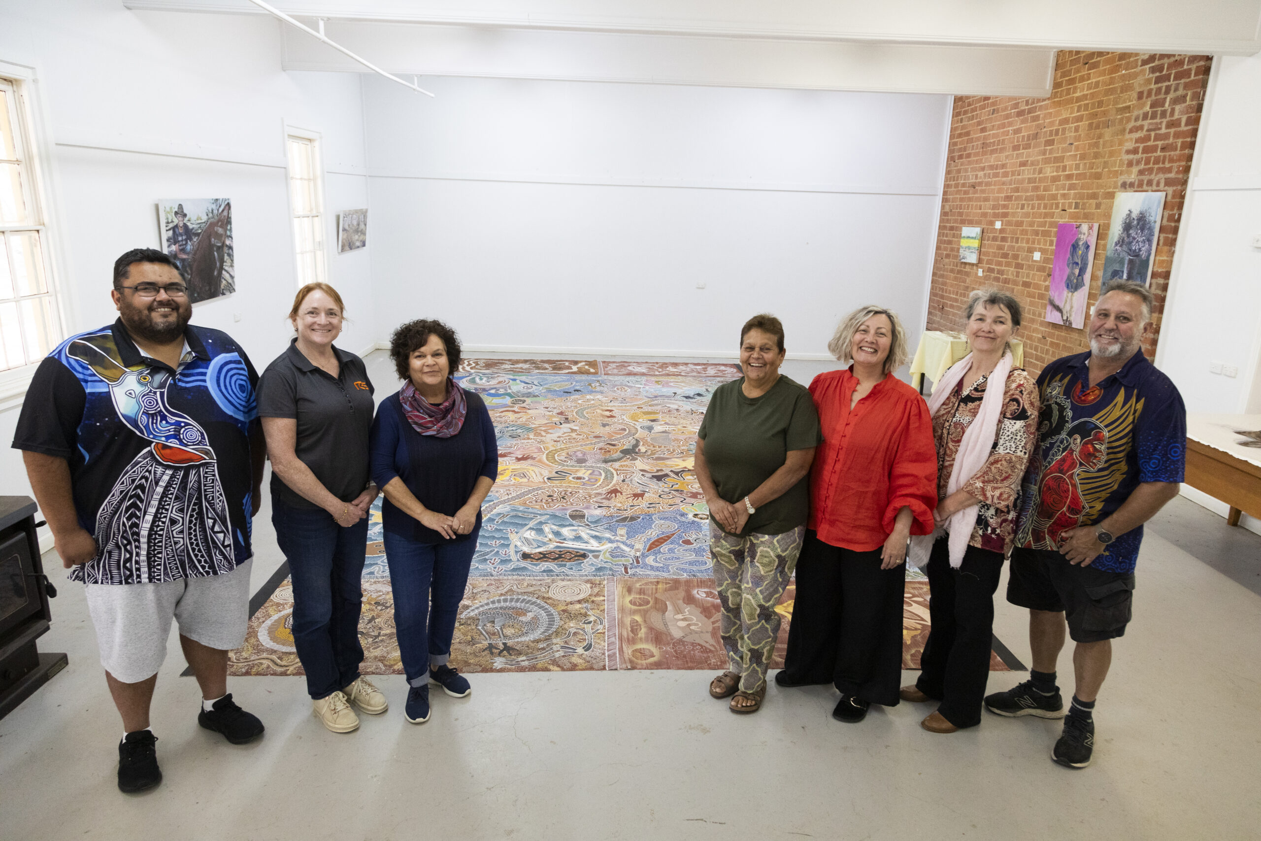 Art gallery smiling group