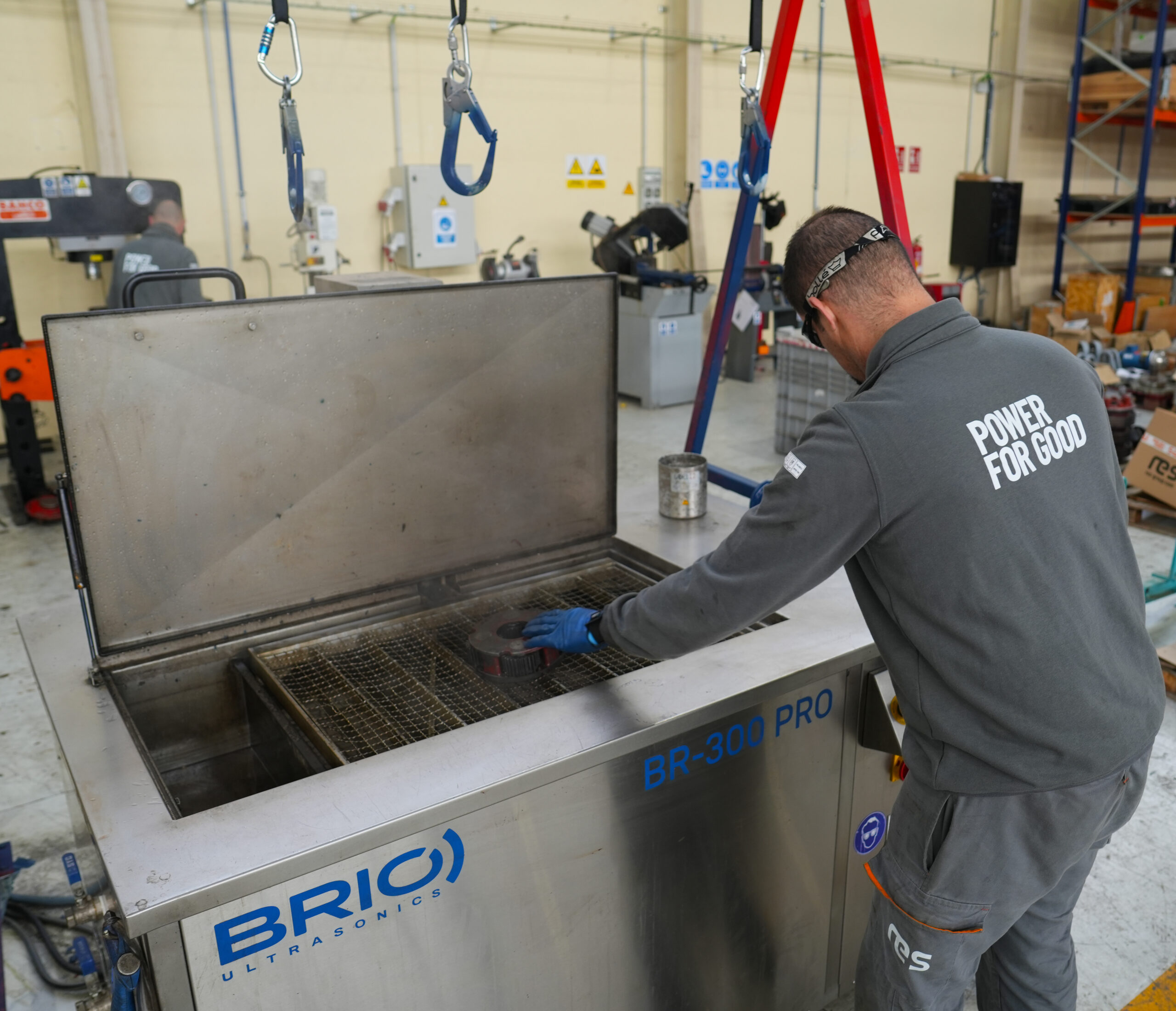 Inside the Albacete workshop a RES worker uses machinery