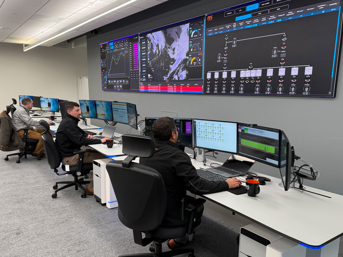 people working at computers in RES' operations control center